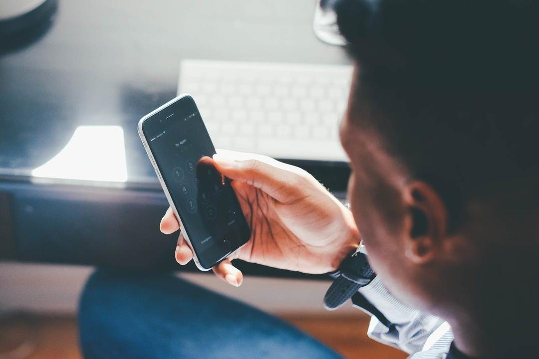 a man holding his phone