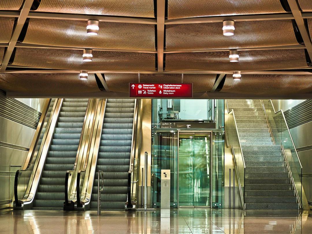 Escalators, an elevator, and a stair