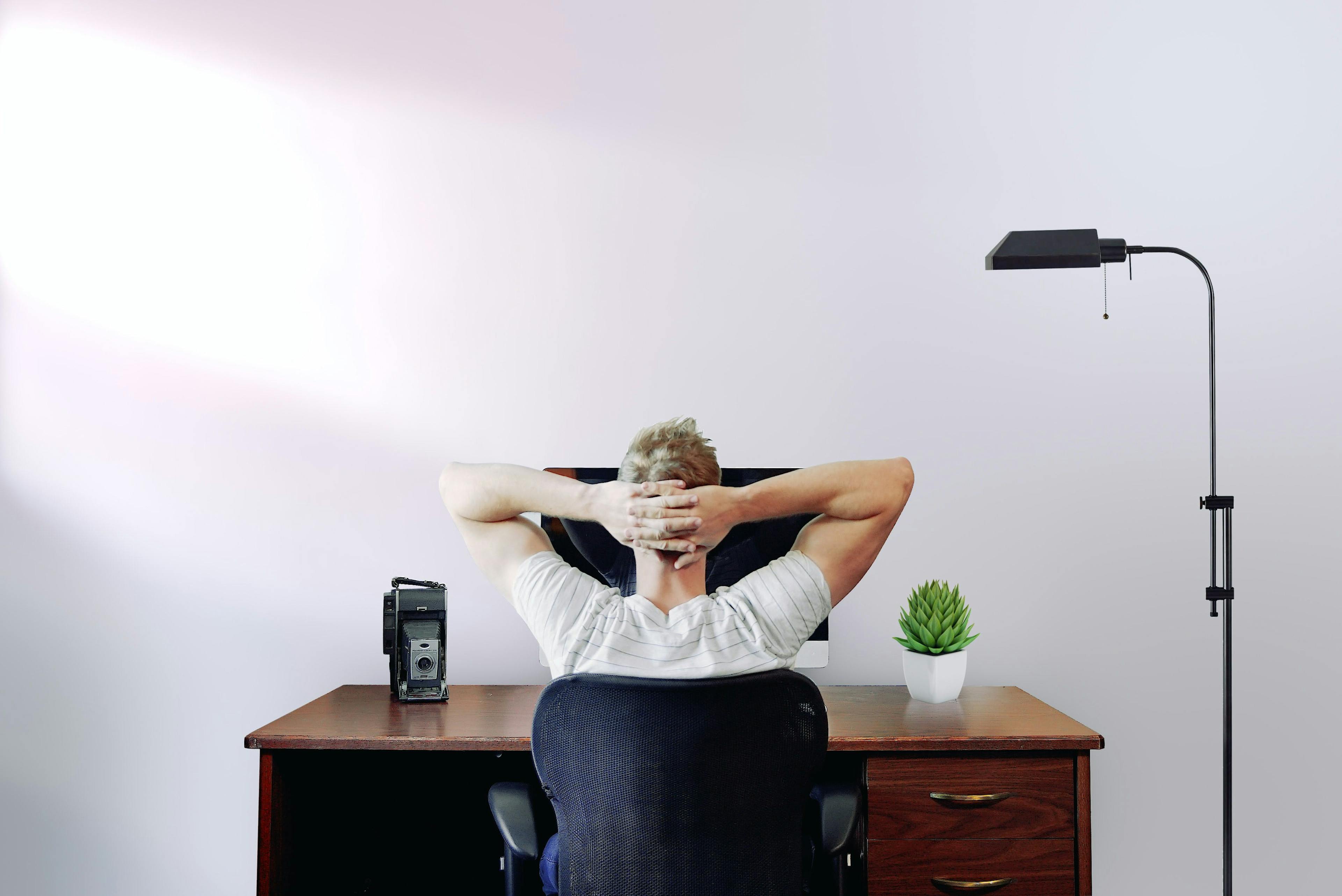 man in front of a computer