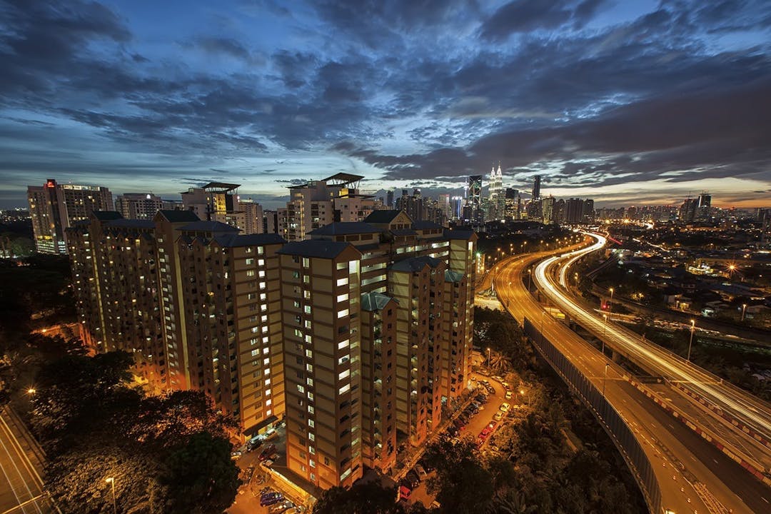 highway with condo at night